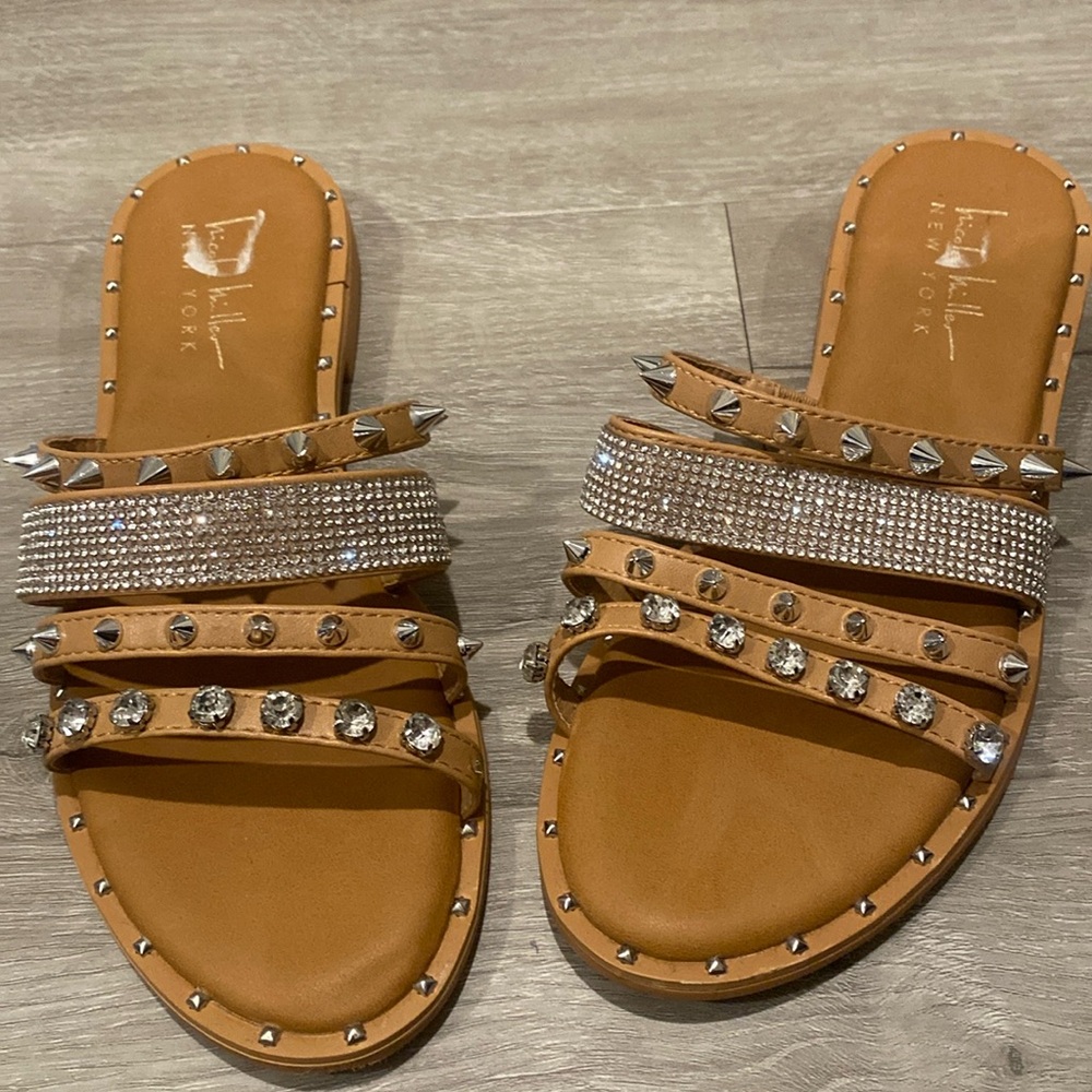 Studded flat sandal by Nicole Miller
